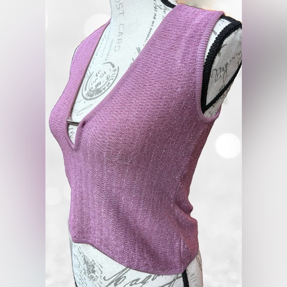 Knit Midriff Top with Plunge Neckline
EUR 44 (runs small)
Like New / Never Worn - Picture 4 of 8